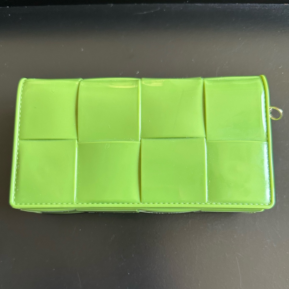 Army green jelly clutch with gold Crossbody chain.
